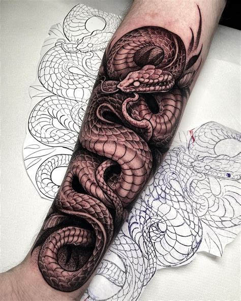 realistic snake head tattoo.